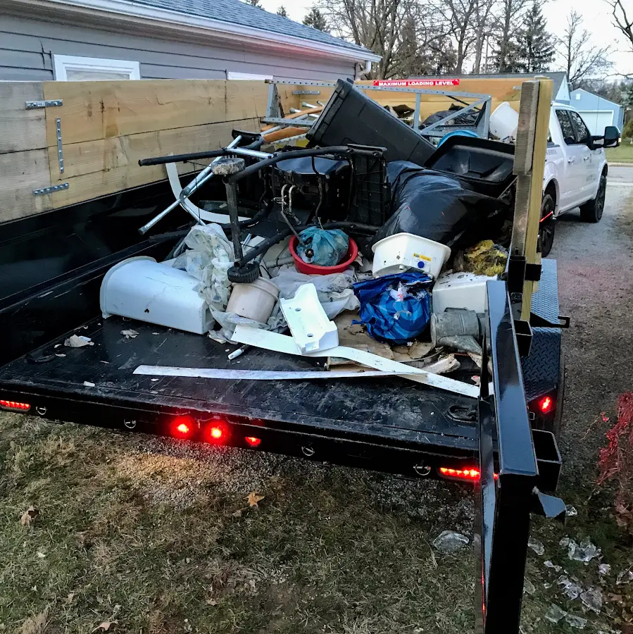 Roll-off dumpster delivered to a residential driveway in Storm Lake