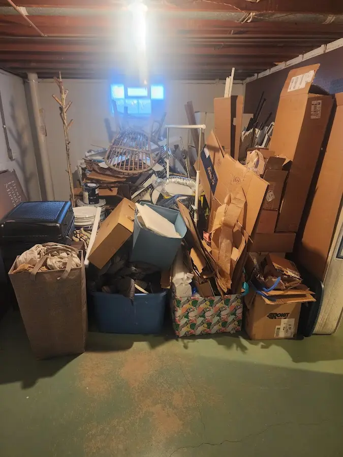 Roll-off dumpster container at job site for Yard Waste Dumpster Rental in Storm Lake